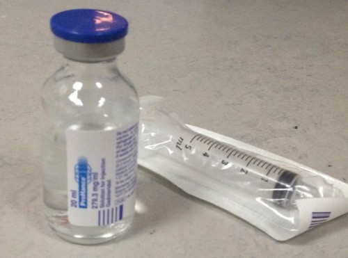 A vial of gadolinium; note that it contains only 20 ml - unlike CT, MR examinations require only a very small volume of contrast to be injected, usually only 10 ml.